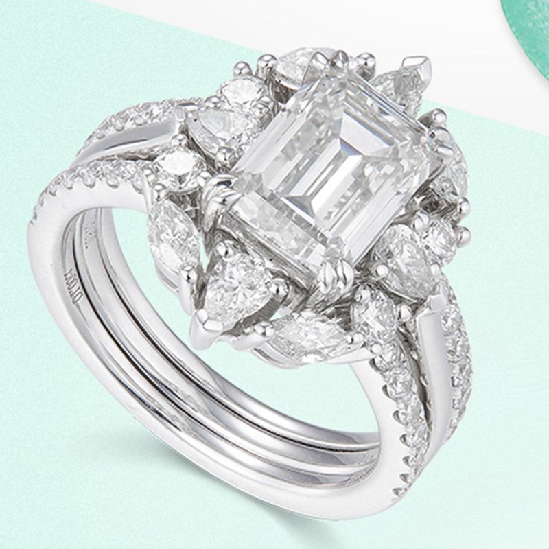 Unique Emerald Cut Halo Engagement Ring