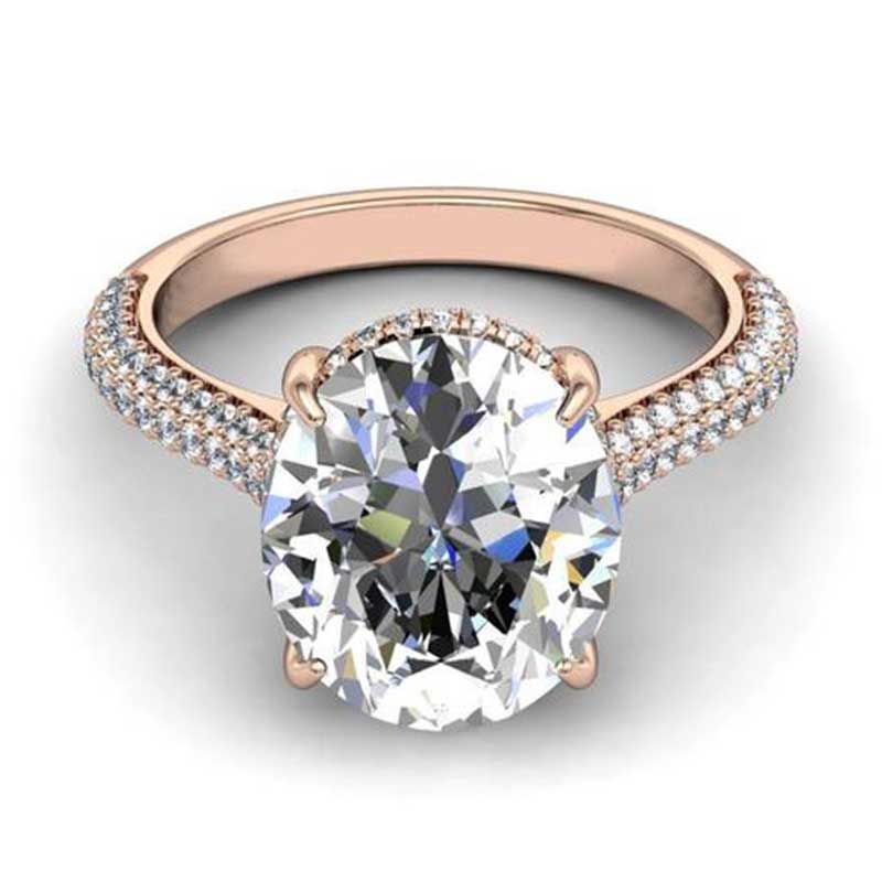 Oval cut white sapphire Rose Gold non traditional best engagement rings